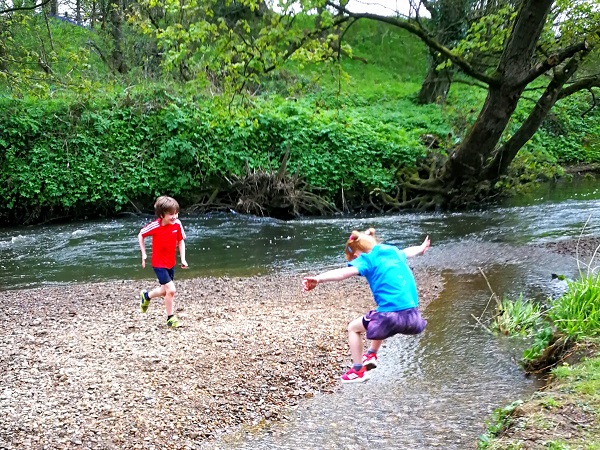 Children playing by the river
